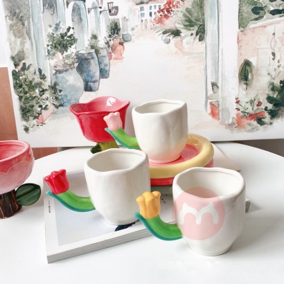 Ceramic water cup with irregular tulip handle