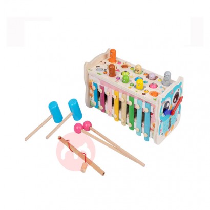 A wooden hammer hammers a musical t...